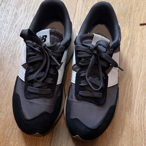 New Balance Kids' Black and White Sneakers